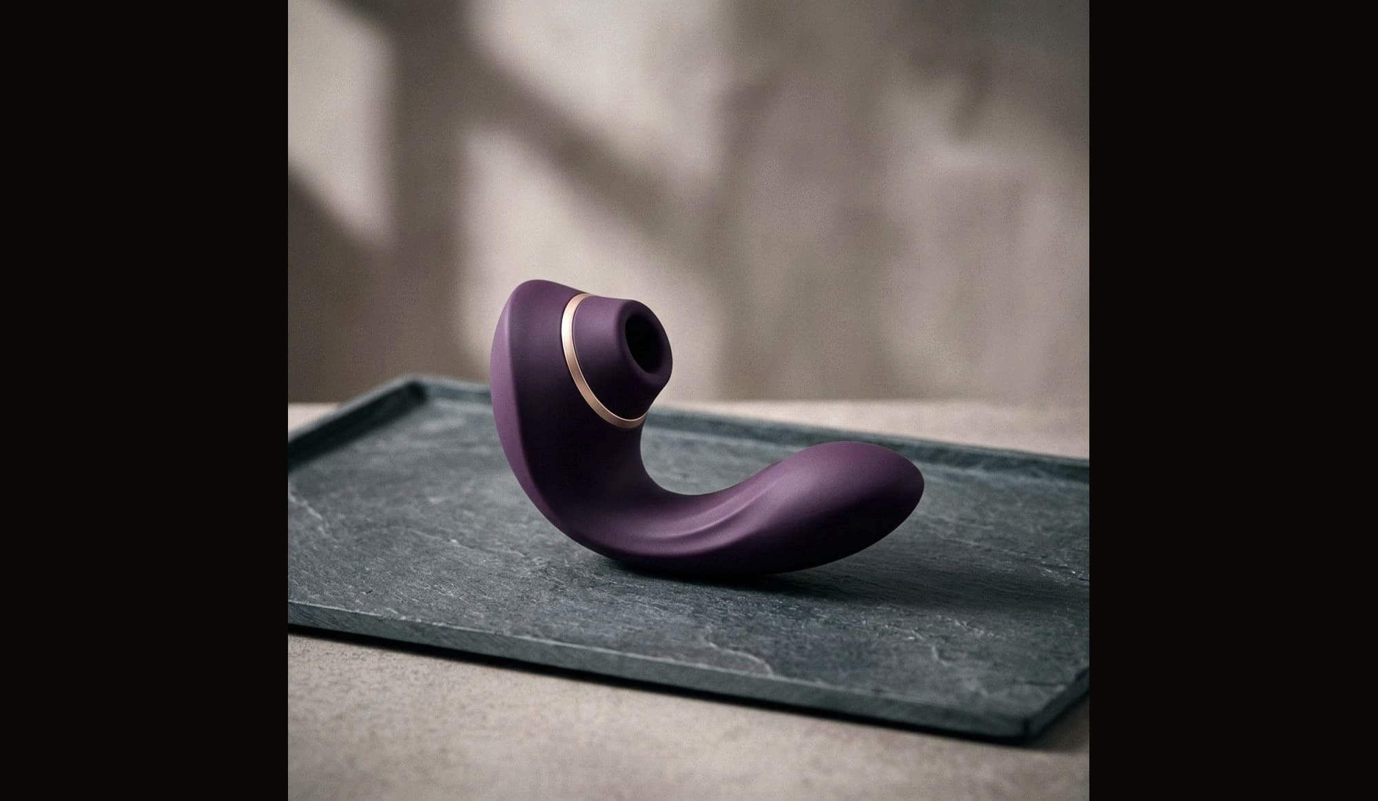 Deep plum satin silicone, with no visible parting line.